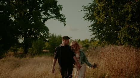 Young-Successful-Hipsters-Walking-And-Smiling-In-Summer-At-Sunset-3