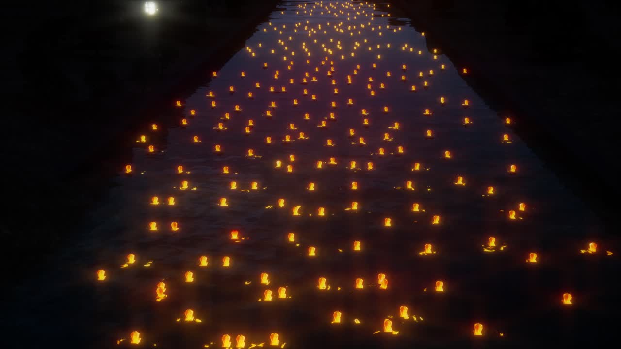 Farolillos flotando sobre el agua de noche durante un festival