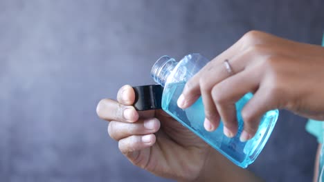 pouring hand sanitizer