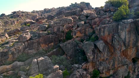 drone shot of rocky cliff face