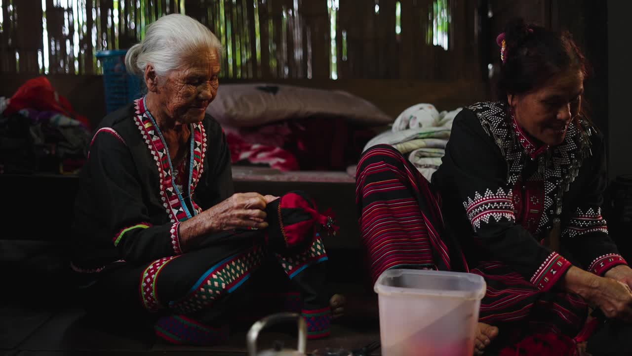 Two older women in traditional clothing