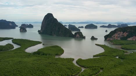 4k drone video panning around samet nangshe viewpoint near phang nga bay in thailand