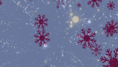 Animation-of-spots-of-lights-over-falling-red-snowflakes