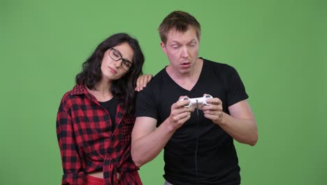 young couple playing games together