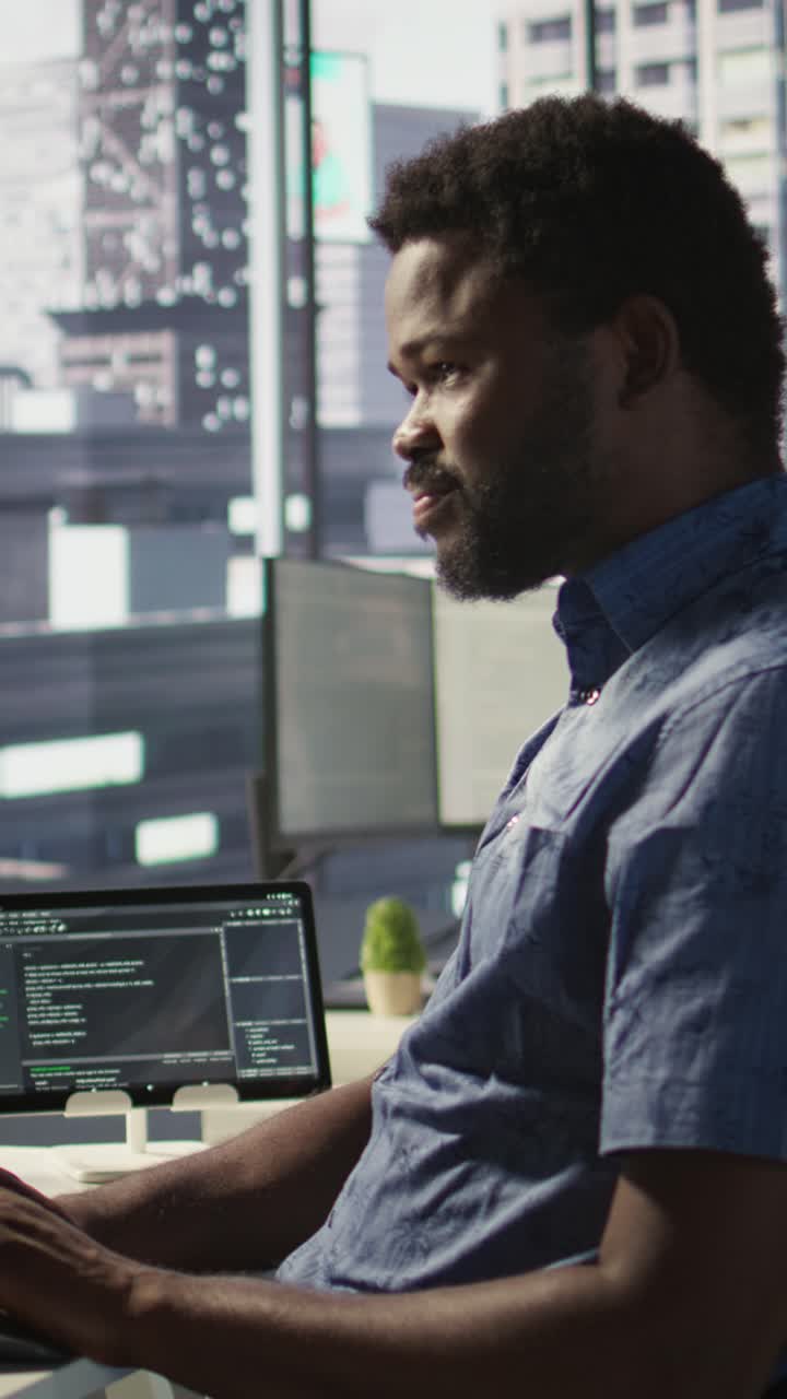 Vertical video Close up of IT expert programming in office using PC