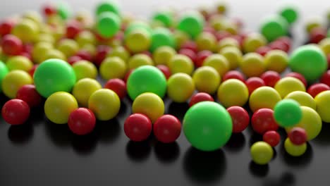 una pila creciente de abstractas esferas coloridas y bolas rodando y cayendo