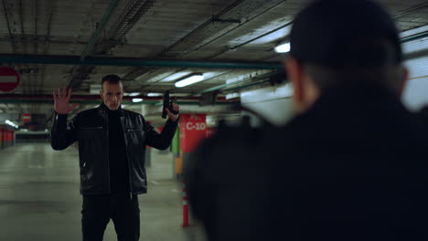 police officer aiming criminal with gun. policeman arresting man with weapon