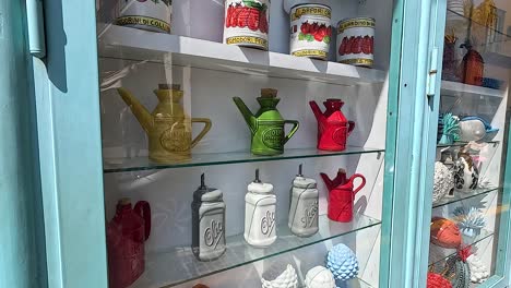 display of vibrant ceramic souvenirs in sorrento, italy