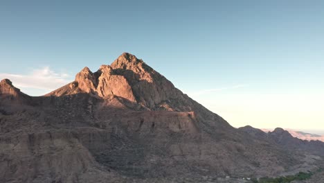 aerial pedestal movement of mountain in middle of nowhere at day, nobody