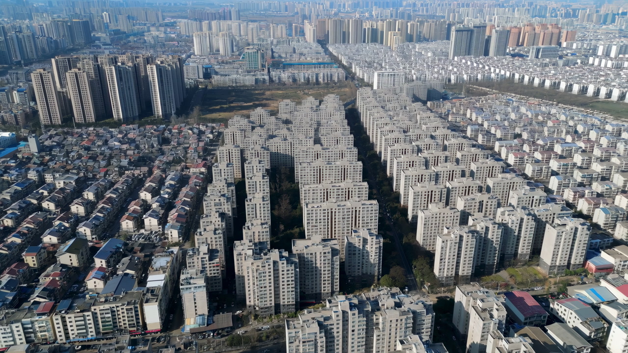 Aerial Uniform Housing Grid Block Rows, Repetitive Apartment Complexes Arranged In Strict Pattern, Concrete