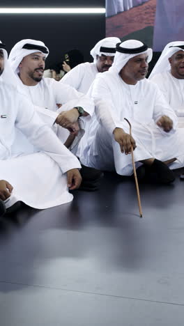 group of men in traditional emirati clothing