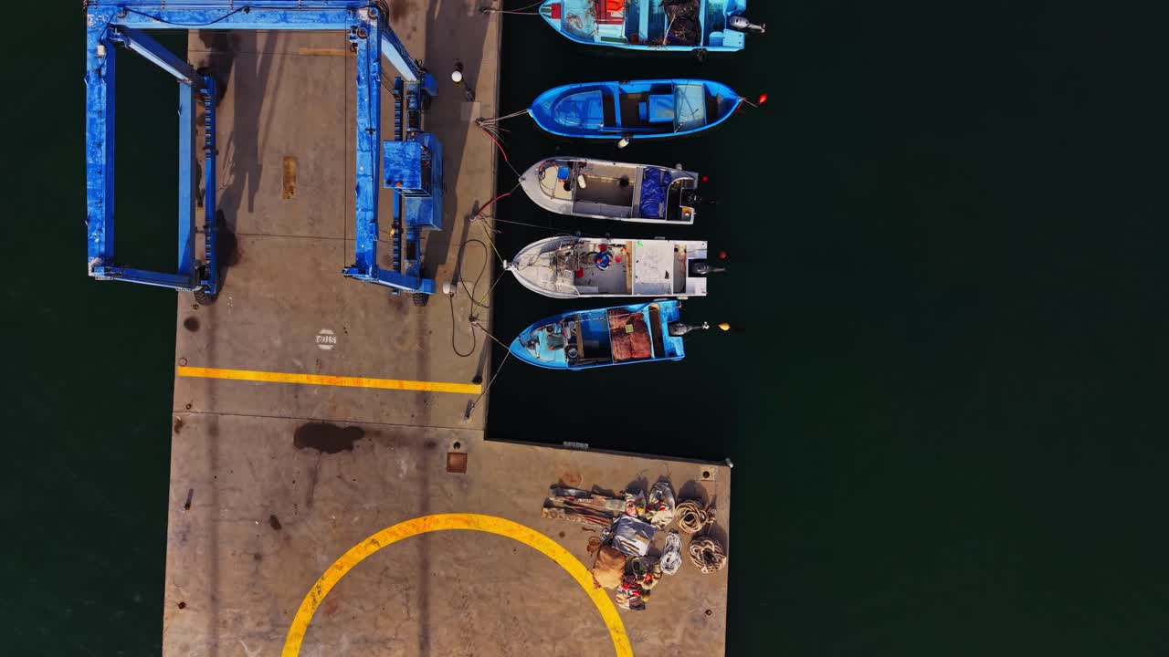 Colorful fishing boats lined up at dock in Bulgaria