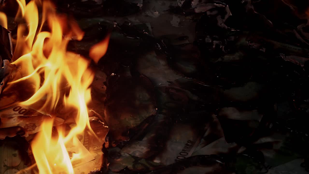 Close-Up of Euro Banknotes Burning in Intense Flames