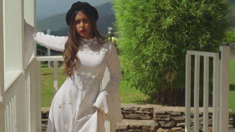 a girl in a classic bridal dress exploring the ruins of a historical fort.