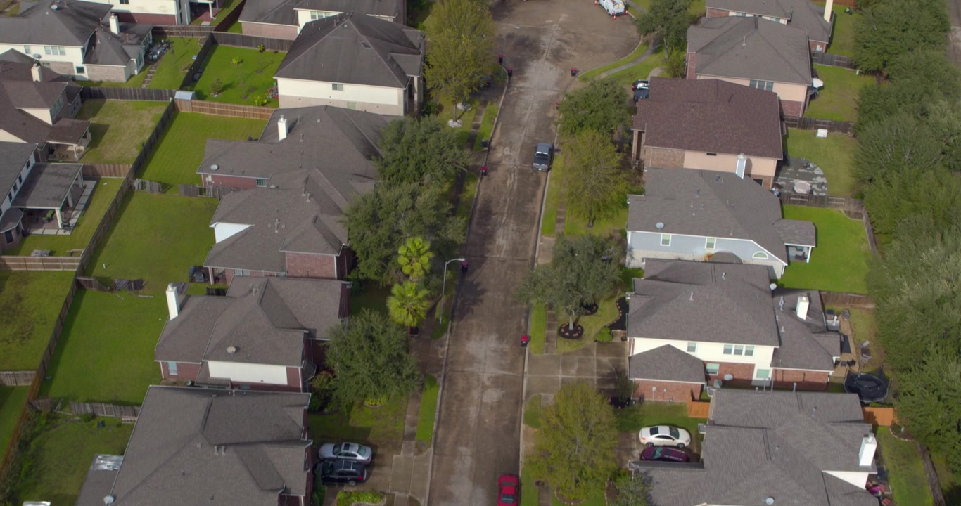 Drone view of suburban homes and neighborhood in Missouri City, Texas