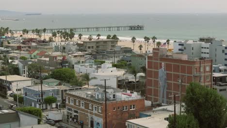 Downtown-Venice,-California---rising-aerial-view-revealing-Venice-Beach