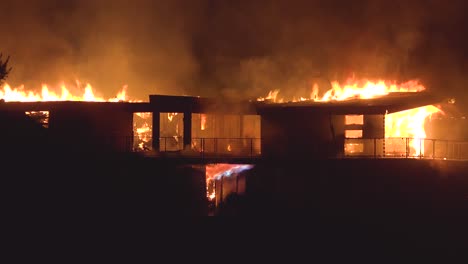 a large home is fully engulfed in flames during the deadly thomas fire in ventura california