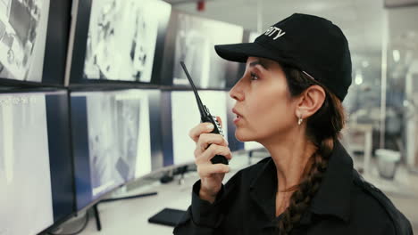 a security guard monitoring security cameras