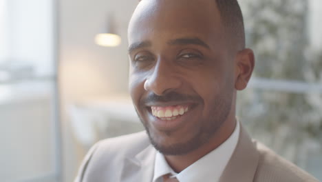 portrait of cheerful african american businessman