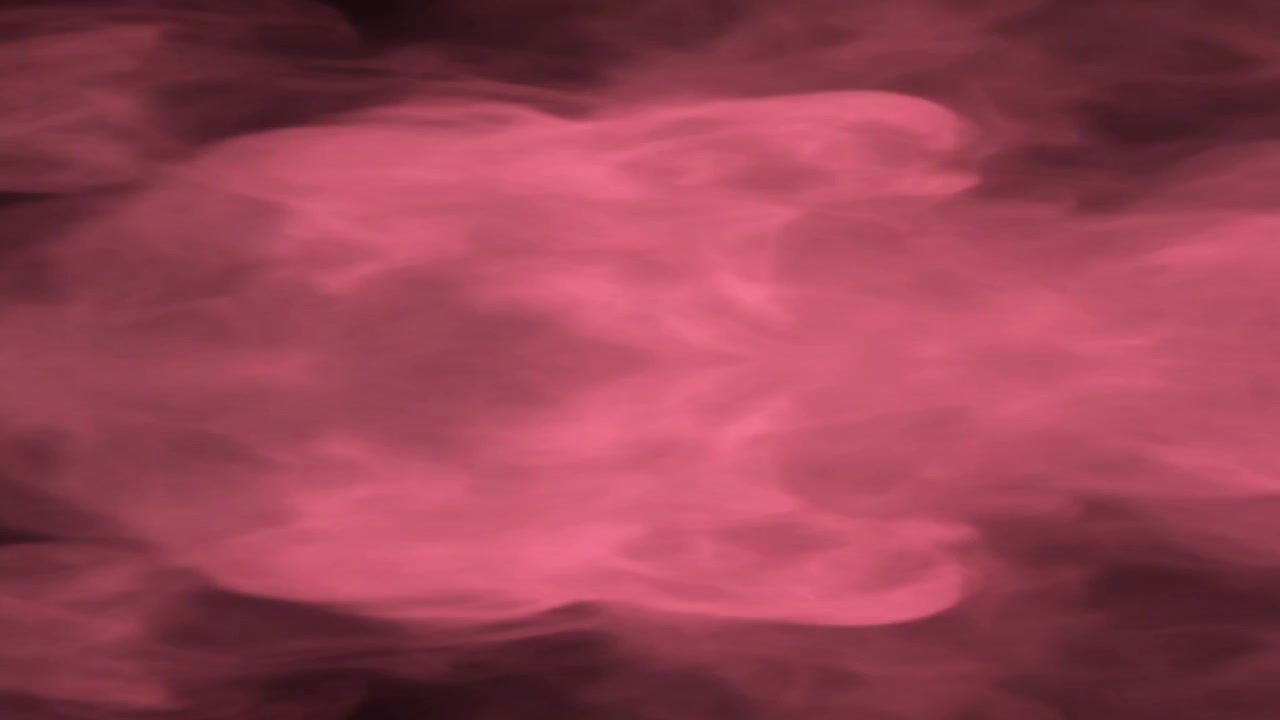 Fumo rosa astratto che turbina su uno sfondo scuro