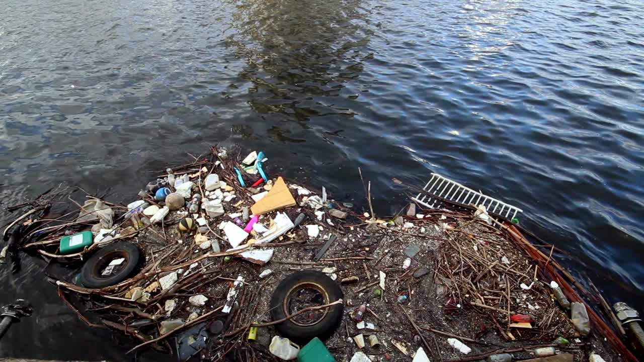 Plastic bottles, bags and other garbage dumped on water in Manchester