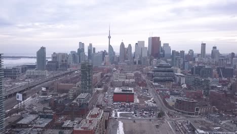 Dynamic-Aerial-View-of-Toronto-Skyline-during-Cold,-Cloudy-Winter-Day