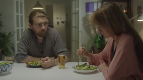 Couple Eating Salad on Dinner at Home