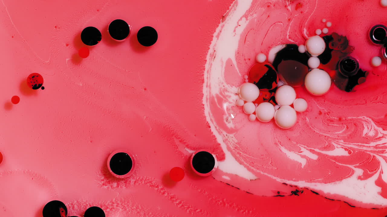 Red and cream colored acrylic paint mix, abstract fluid art background with Valentine's Day color scheme