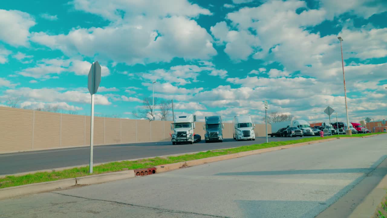 Truck drivers parked on I-294 Service Plaza Truck Stop. Timelapse of logistics in America.