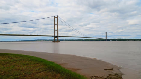 aerial view of humber bridge, 12th largest single-span worldwide, connecting lincolnshire to humberside over river humber