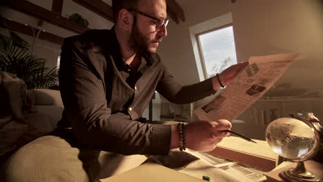 man reading historical documents