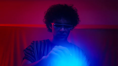 person in futuristic glasses with blue neon light
