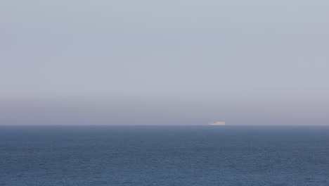 cruise ship moving slowly through the open water, creating a serene scene