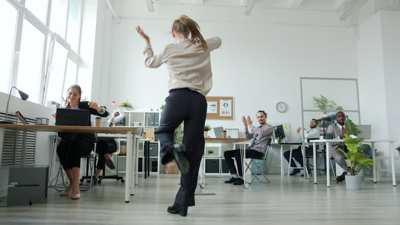 Happy Team Celebrating in Modern Office