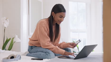 woman, typing on laptop and plane ticket