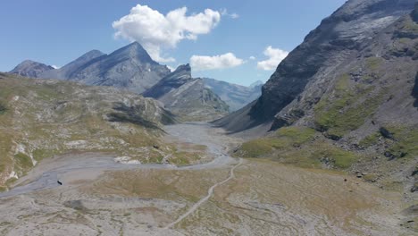 Aerial-of-a-dry-river-bed-in-the-mountains