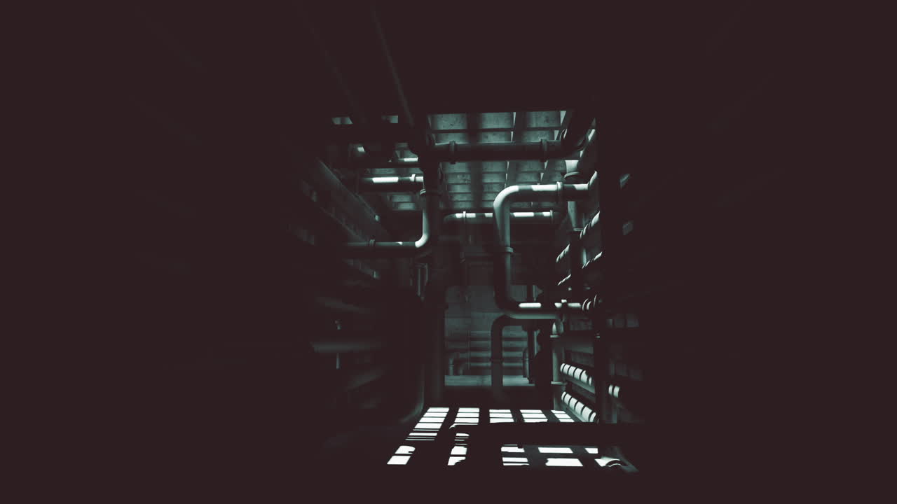 Exploring the dark concrete interior of an industrial building at night
