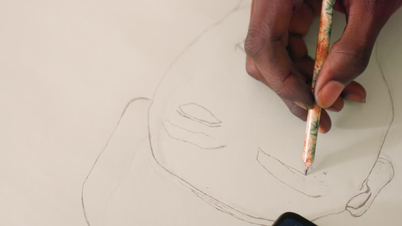 Refining features with precise strokes. Closeup of artist shaping facial contours carefully. Artist meticulously enhancing mouth and chin outlines as part of preliminary sketching process