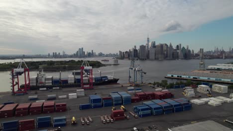 industrial cargo being loaded in new york harbor, brooklyn navy yard, 4k