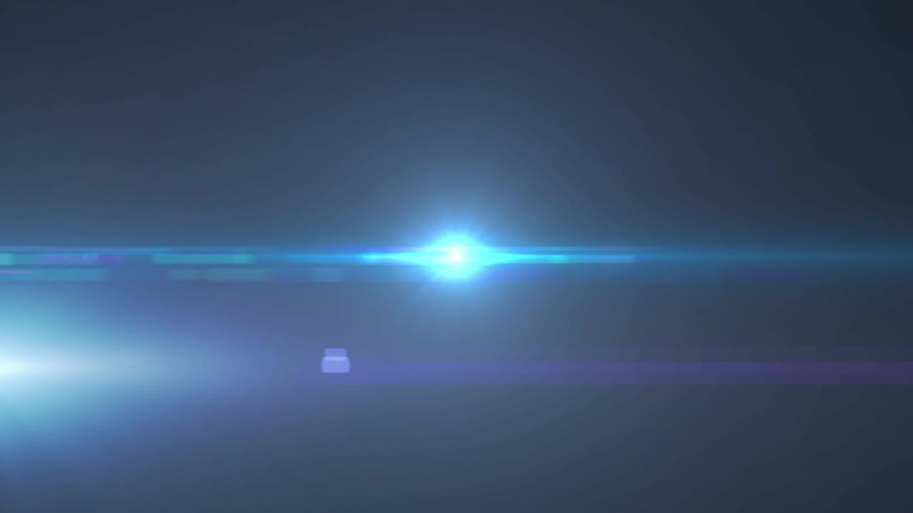 Animazione di un faretto blu con bagliore dell'obiettivo e fasci di luce che si muovono su uno sfondo scuro