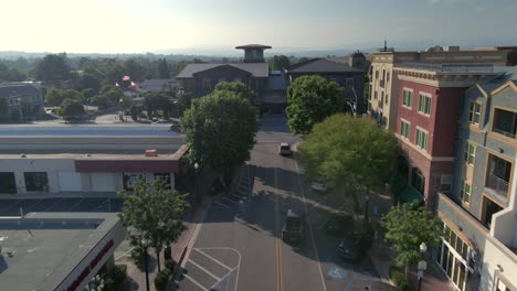 aerial view flying over streets of downtown valencia, in sunny california, usa