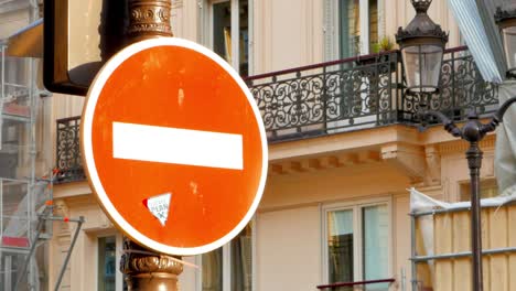 do not enter traffic sign, slow dolly-in zoom, urban setting