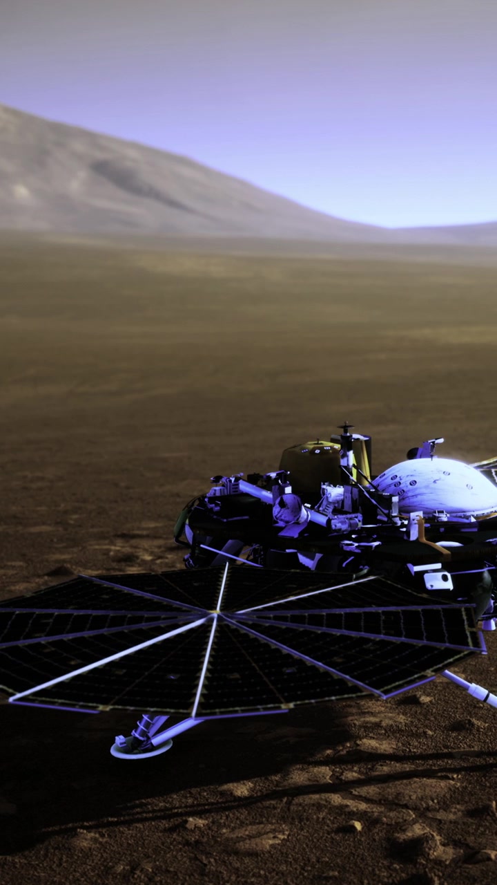 Rover explores the surface of another planet under a distant sky