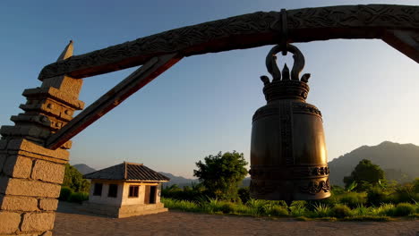 ancient temple bell at sunrise
