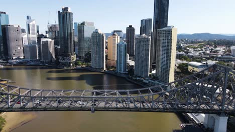 panning aerial view of the story bridge a heritage-listed steel cantilever bridge spanning the brisbane river. aerial view