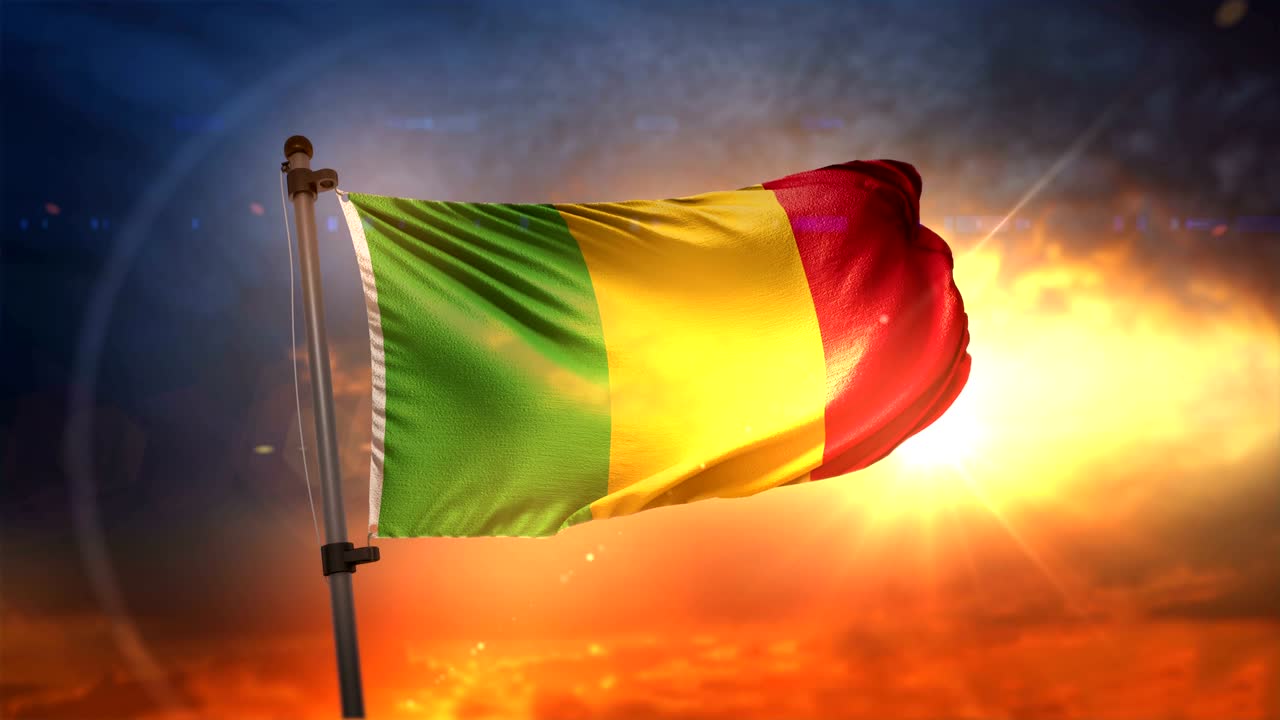 Mali Flag Backlit At Beautiful Sunrise Loop Slow Motion 4K