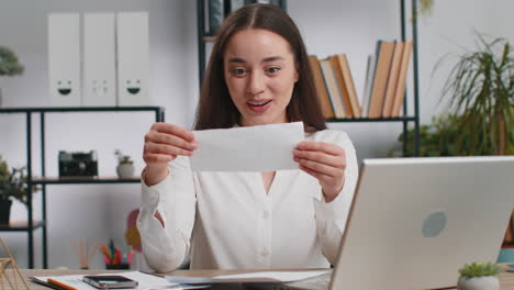 business woman girl open envelope letter reads it career growth advance promotion bank loan approve