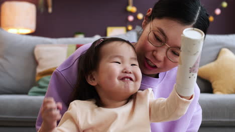 Asian-mother-with-her-baby