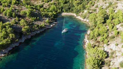 yacht on adriatic coast with vegetation on uska bay, lastovo, croatia