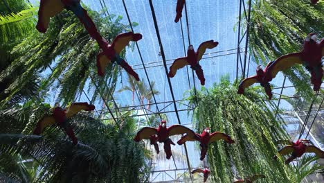 hanging exotic parrots decor decoration pattaya nong nooch botanical garden thailand
